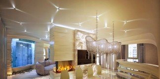 Jellyfish-inspired lighting and a wall of jellyfish enhance this gorgeous interior (architectureadmirers)