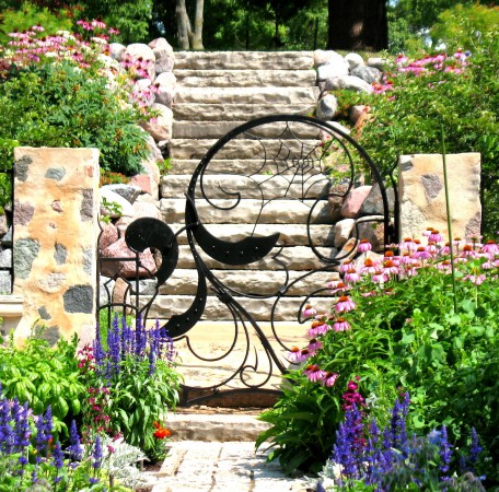 Flowing iron garden gate design 