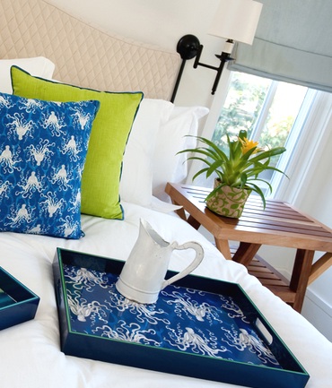 Octopus pillow and trays add color and interest to this décor