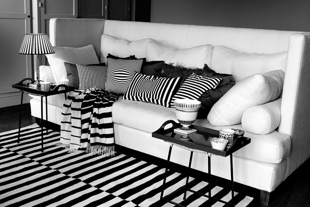 Stripes add depth and fun to a black and white room (condenast.co.uk)