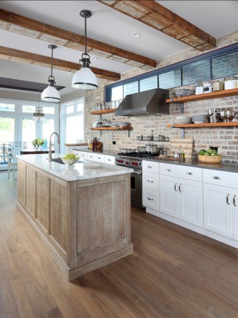 A white kitchen with open shelving.