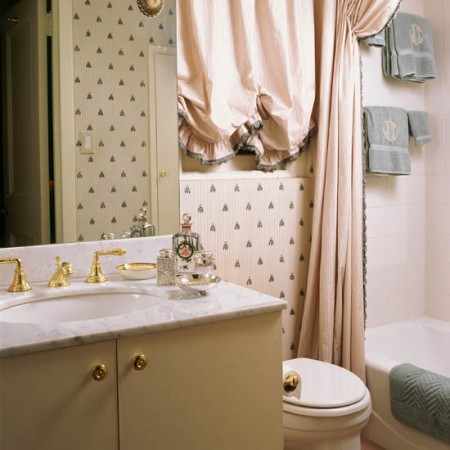 How To Create The Perfect Pastel Bathroom with a pink shower curtain.