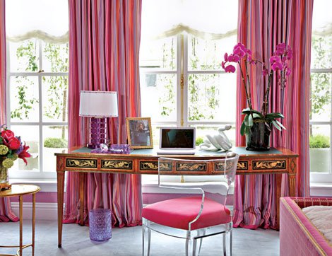 A feminine home office design with a pink and gold bedroom aesthetic, complete with a desk and chair.