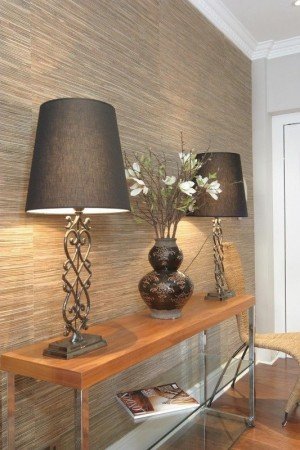 Metallic wallpaper behind lighting will diffuse and scatter the light glamorously (pinterest.com) 