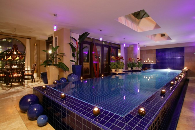 A cozy and luxurious indoor swimming pool space