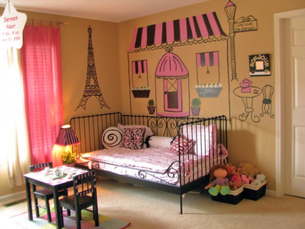 Creating The Bedroom Of Your Children's Dreams with an Eiffel tower painted on the wall.