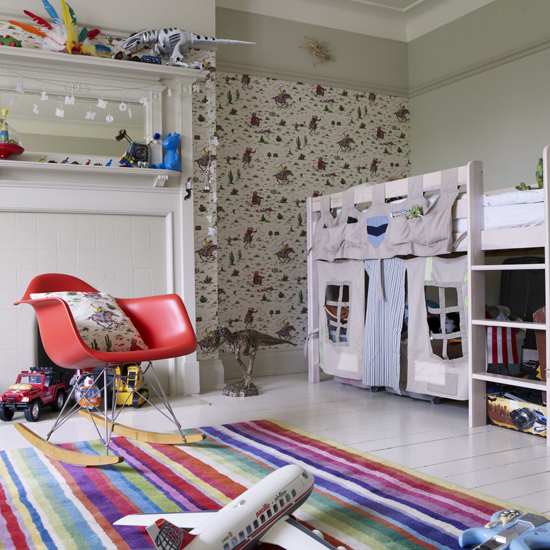 A striped rug in a child's dreamy room.