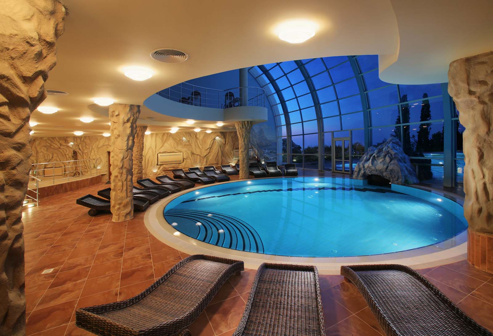 An indoor circular swimming pool.