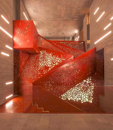 A trendy red staircase featuring a perforated design in a building.