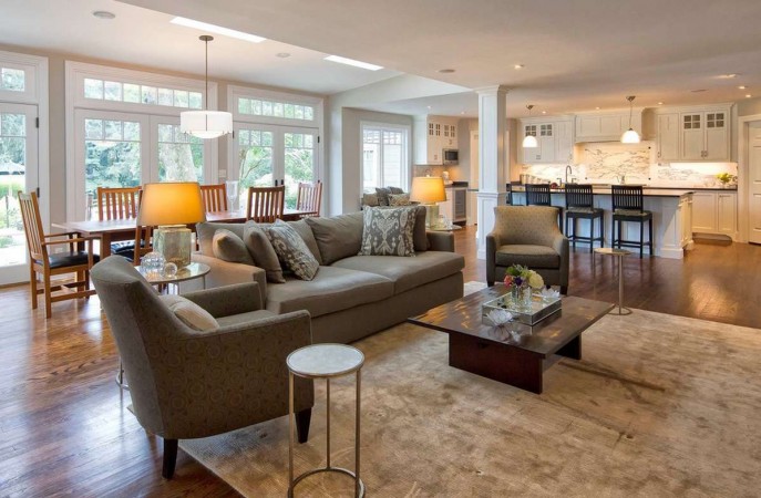 A warm and inviting living and dining space featuring hardwood floors.