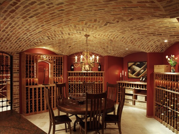 Notice the curved brick ceiling in this beautiful wine cellar 