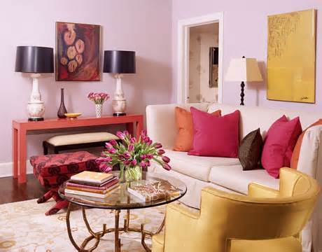 Pink and gold upholstery and accents create a pleasing color combination 