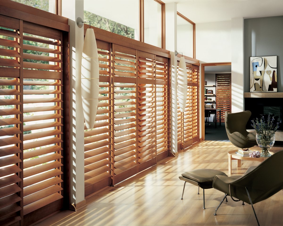 A living room showcasing the timeless elegance of wooden shutters.