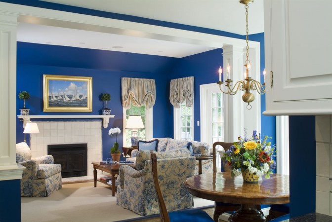 Royal blue walls enhance this traditional space 