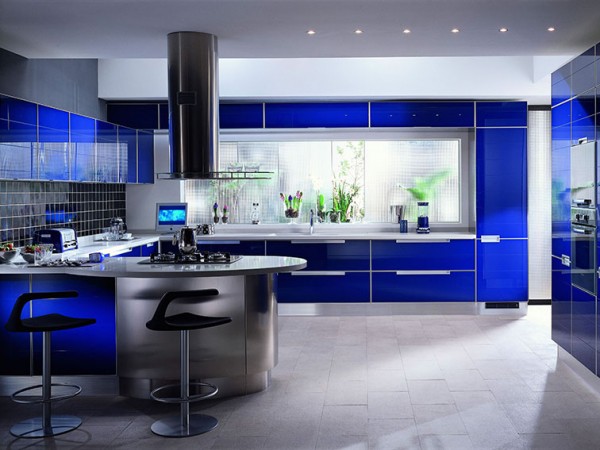 An Interior Design Tribute to Blue with stainless steel appliances.