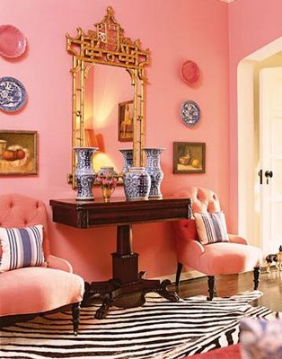 A zebra print rug adds a touch of black to this pink hallway