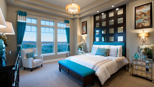 A bedroom with blue accents.