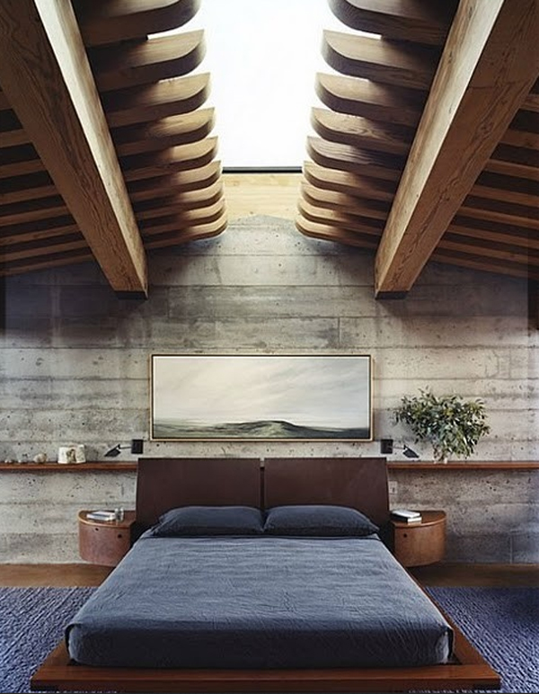 The contrast between the voldness of the concrete and the warmth of the wood is animated by zenithal light (www.homemydesign.com)