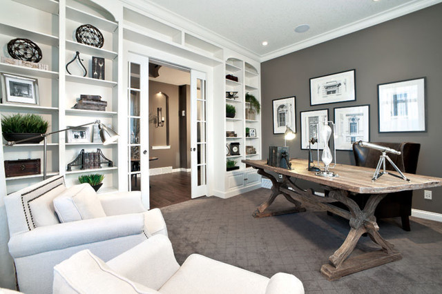 A home office with a white desk and bookshelves that embodies the essence of 