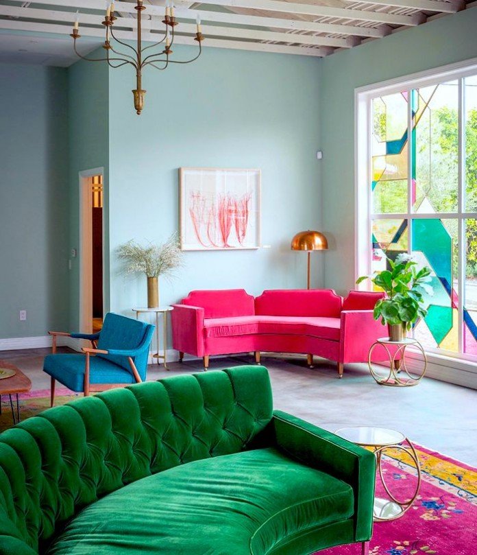 Bright jewel tones create a balanced and vibrant modern room