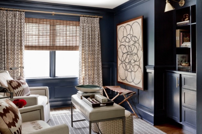 Navy blue walls enhance this space