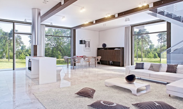 A living room with large windows and white furniture featuring marble accents.