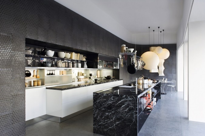 An elegant modern kitchen with black marble accents