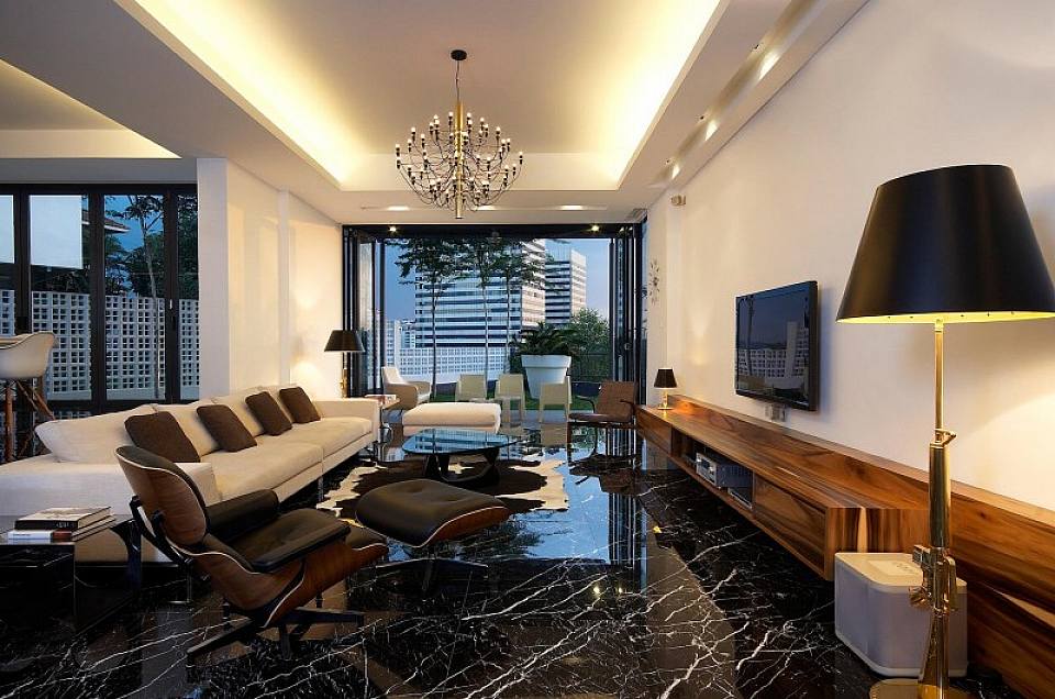 Black marble floors give this room a sleek, modern flair with classic drama