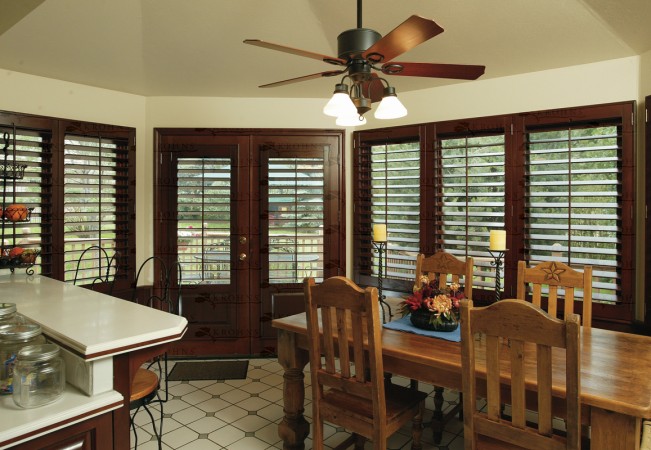 Dark stained shutters enhance this room's character