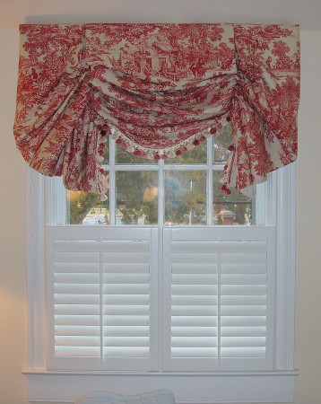 Half shutters can be topped with a valance 
