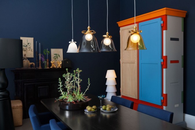 This dark and moody blue is a beautiful treatment for this room 