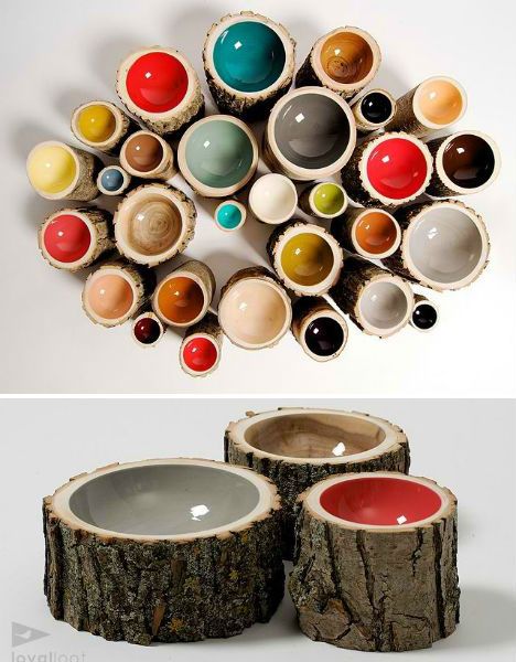 A collection of bowls made from tree trunks.