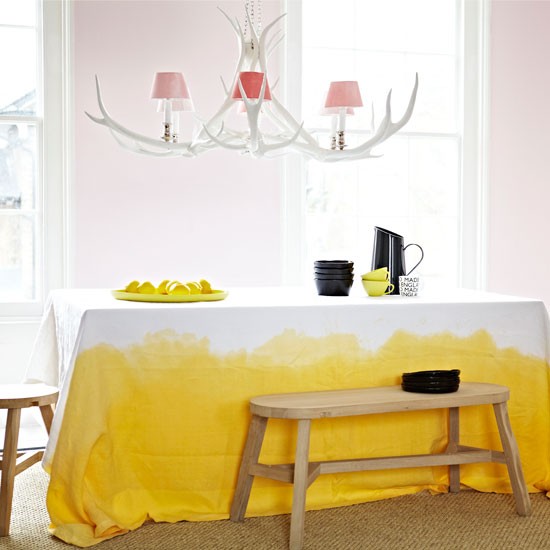 Simple yet sophisticated dining room with yellow accents (housetohome.co.uk)