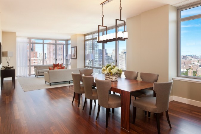 A modern dining area in an open floor plan is perfect for entertaining