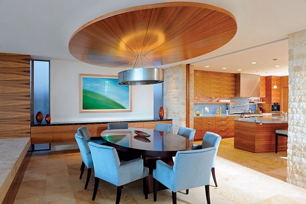 A unique ceiling feature highlights this modern dining space