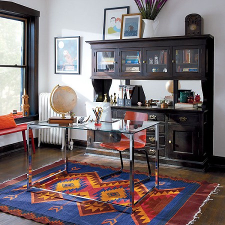 A colorful rug in an inspiring home office.