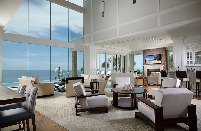 A fuss-free living room with a view of the ocean.