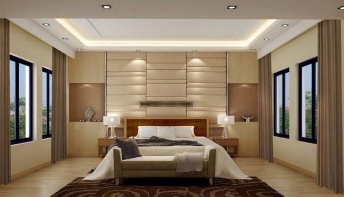 Soft glow of lights and neutral palette keep this bedroom serene