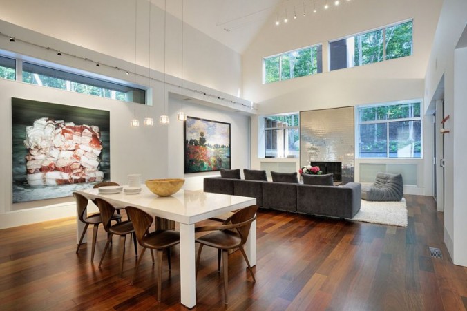 A modern open floor plan with dining area is light and airy