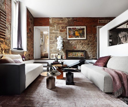 Brick wall adds interest to this room