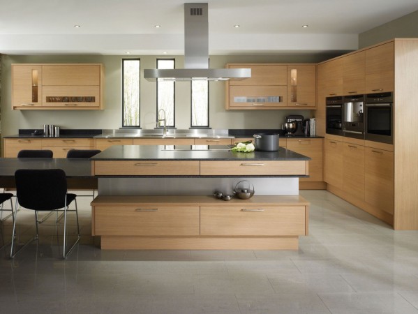 A modern kitchen with wooden cabinets and stainless steel appliances: 3 Reasons to Love the Sleek Design.