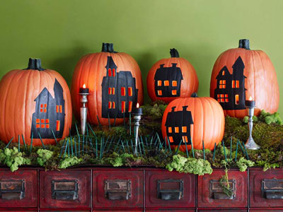 Keywords: pumpkins, houses

Modified description: Fall home decor featuring pumpkins with miniature houses.
