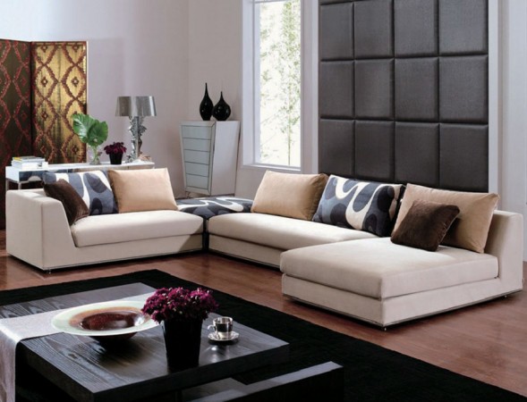 A living room with a low-profile sectional sofa and coffee table.