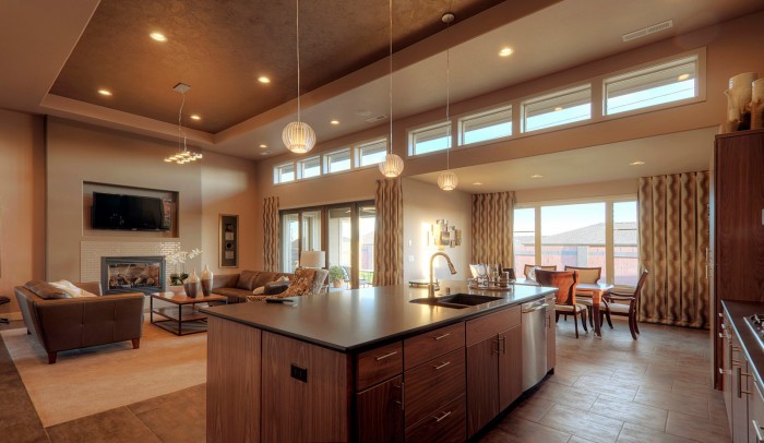A kitchen with a large island, perfect for enjoying the open floor plan.