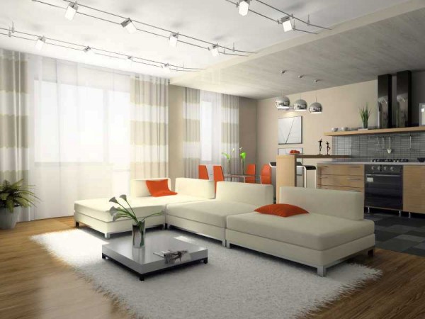 A modern living room with low-profile white furniture.