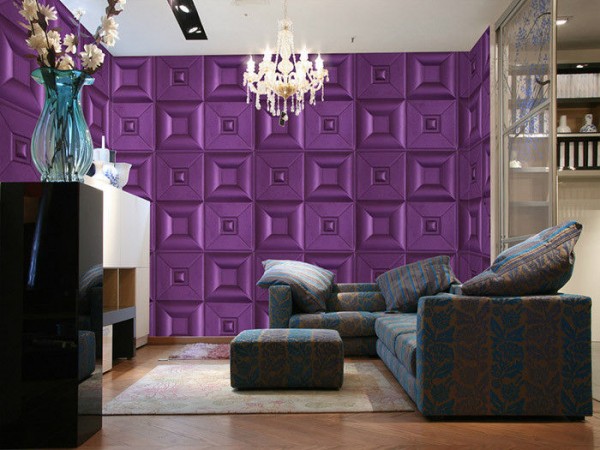 A living room with a vibrant purple wall.