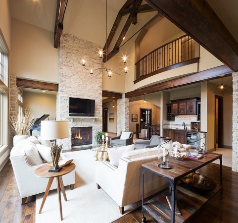 Dark wood beams and wood accents give character to this modern space 