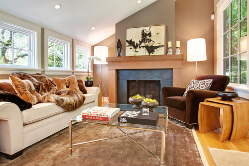 A cozy living room with a fireplace, perfect for fall.