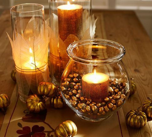 Embellished glass containers with candles have a nice glow
