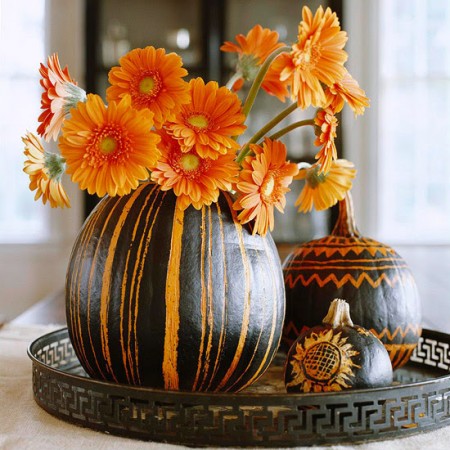 Pumpkins adorn a decorative tray for fall 